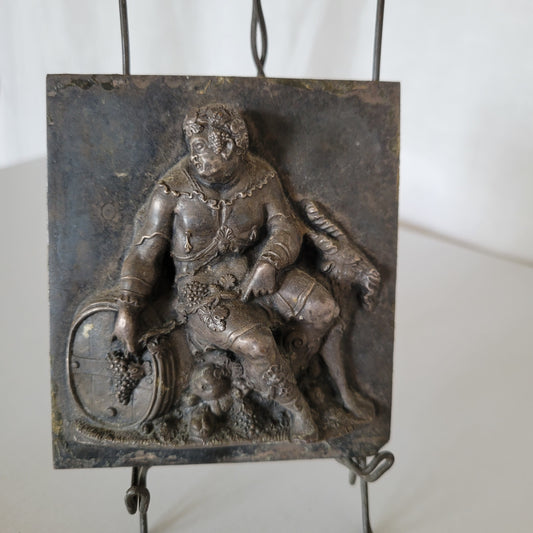 Métal forgé représentant BACCHUS