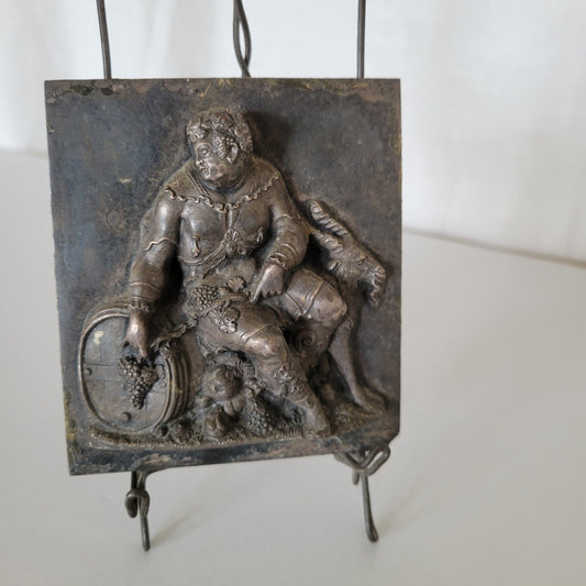 Métal forgé représentant BACCHUS