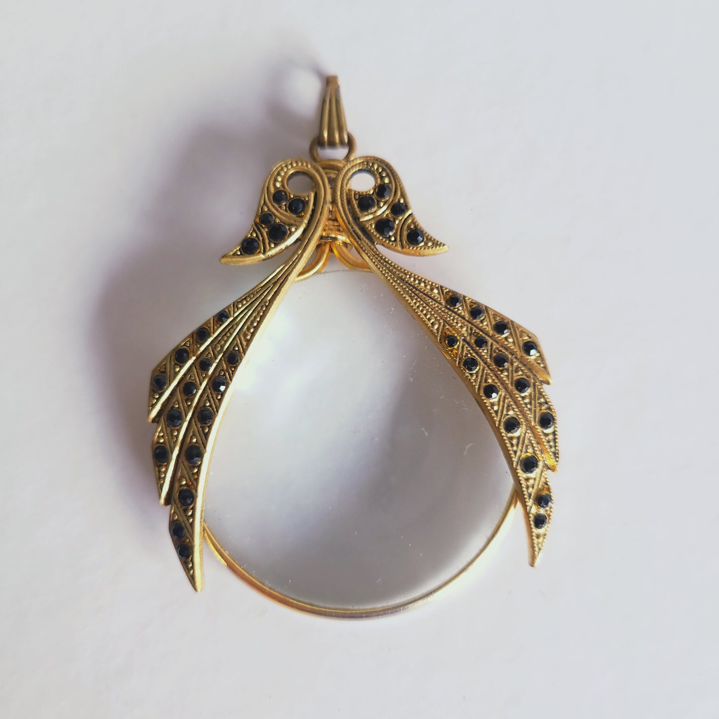 Pendentif loupe doré, vintage.
