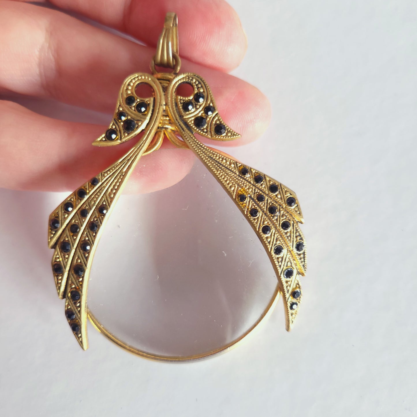 Pendentif loupe doré, vintage.