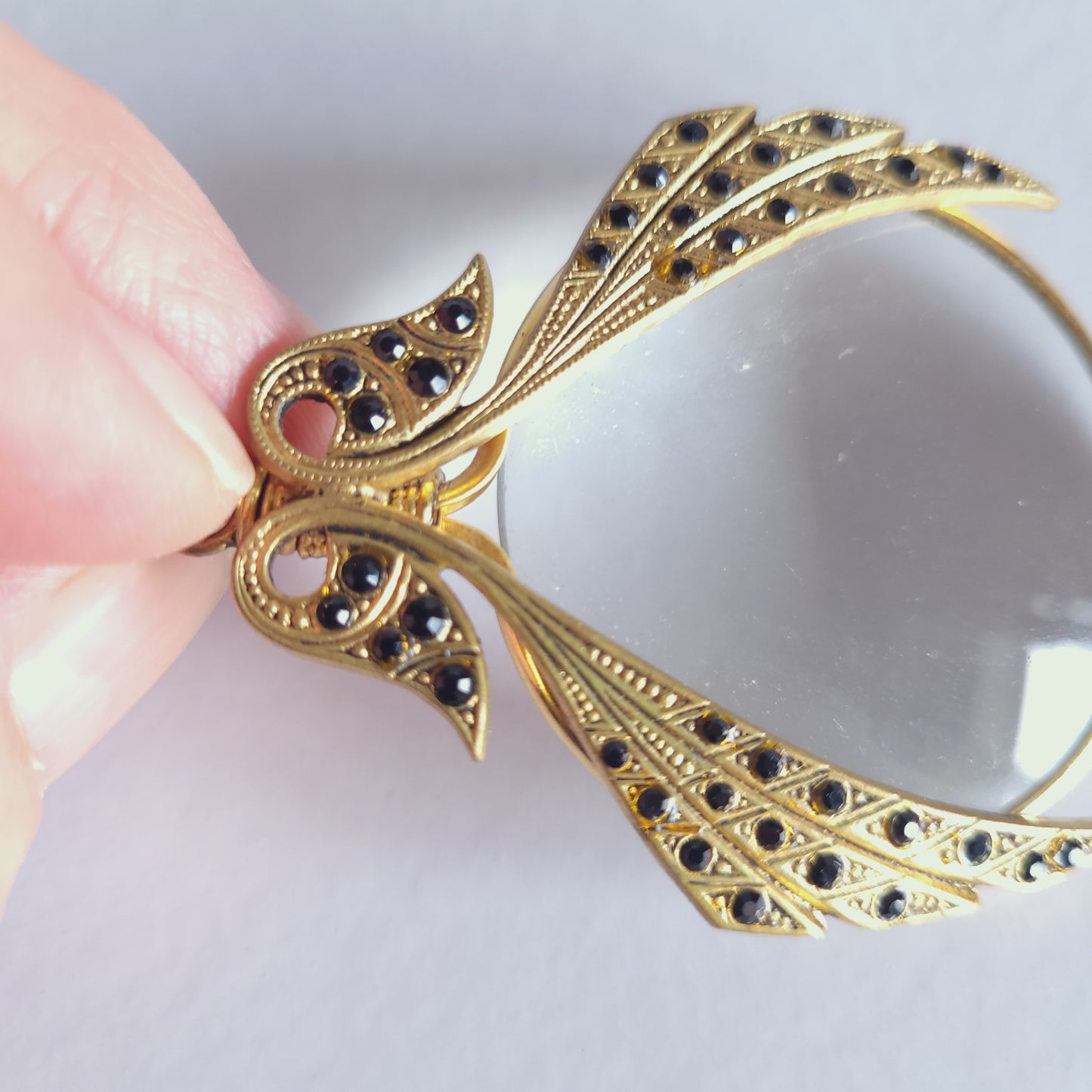 Pendentif loupe doré, vintage.