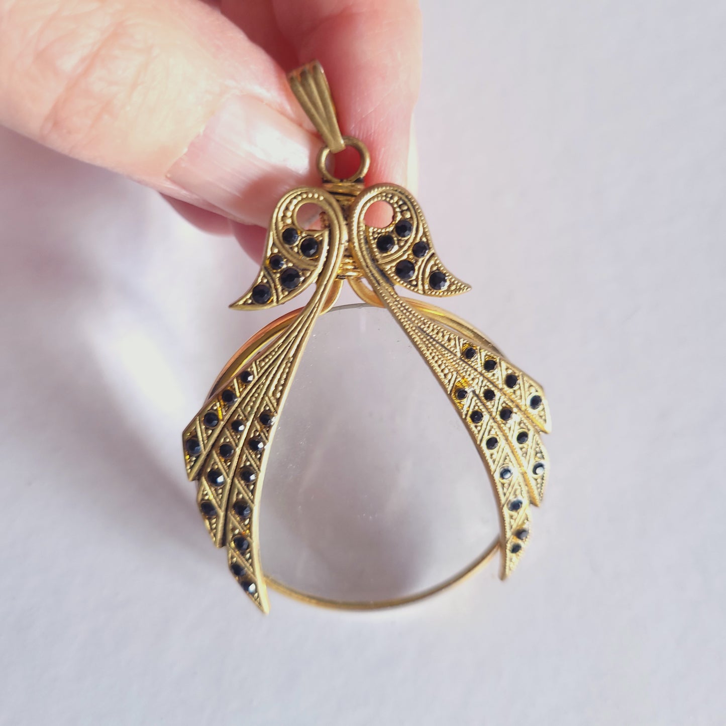 Pendentif loupe doré, vintage.